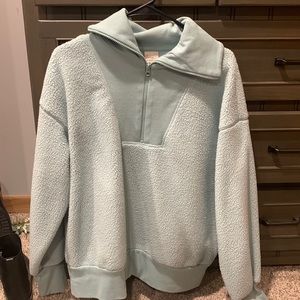 Crew neck zip up sweater worn once - fuzzy inside and out aqua color
